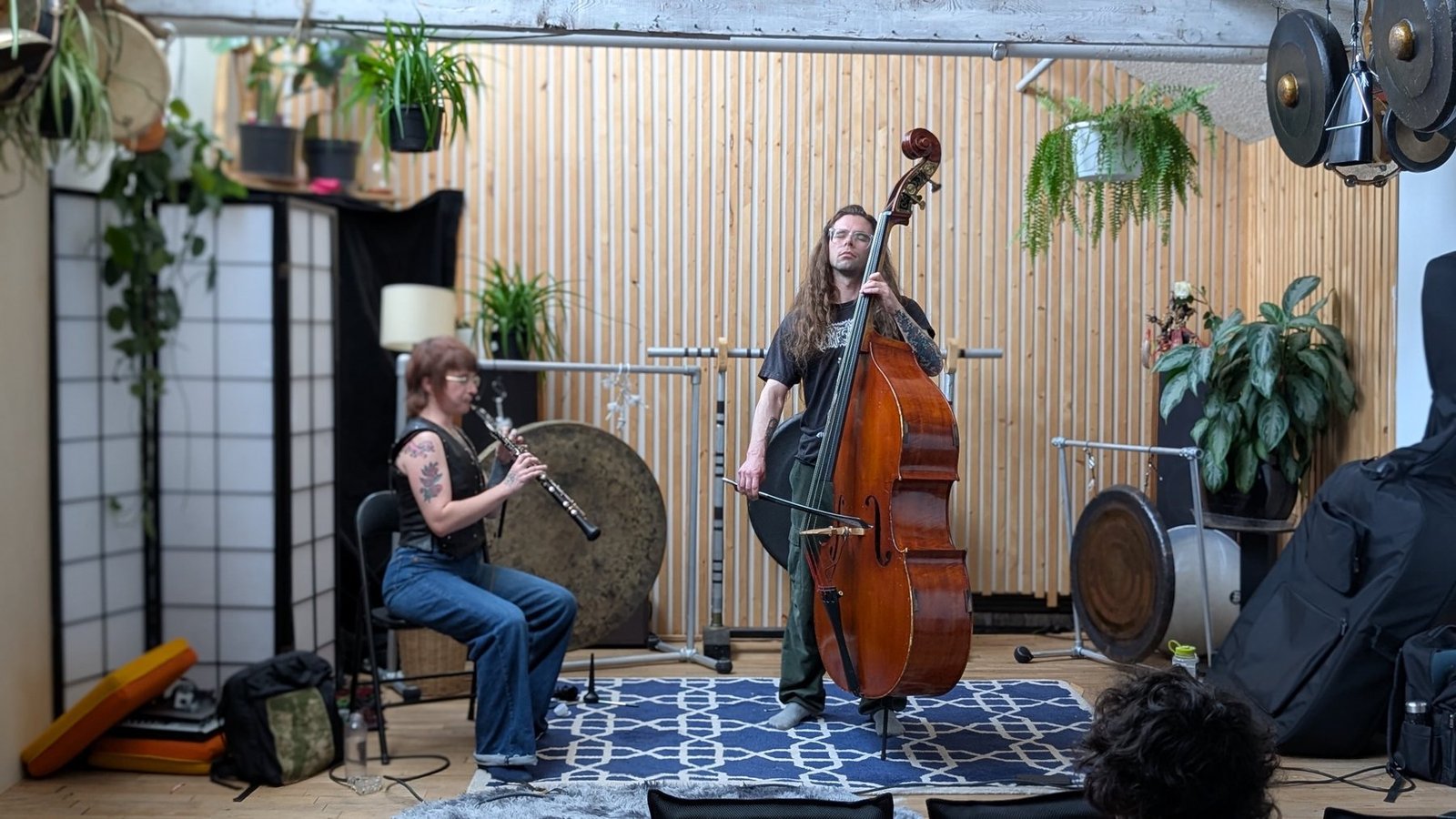Nikko Whitworth and Haley Bird of how to survive a high rise hotel fire performing in the Gong Library.