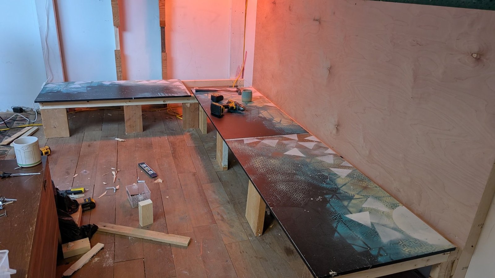 Custom benches built from the decommissioned Sonic Ping-Pong table materials inside the Gong Library.