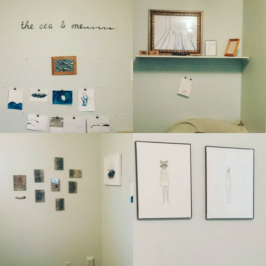 Four-panel installation view showing artworks hung on white walls